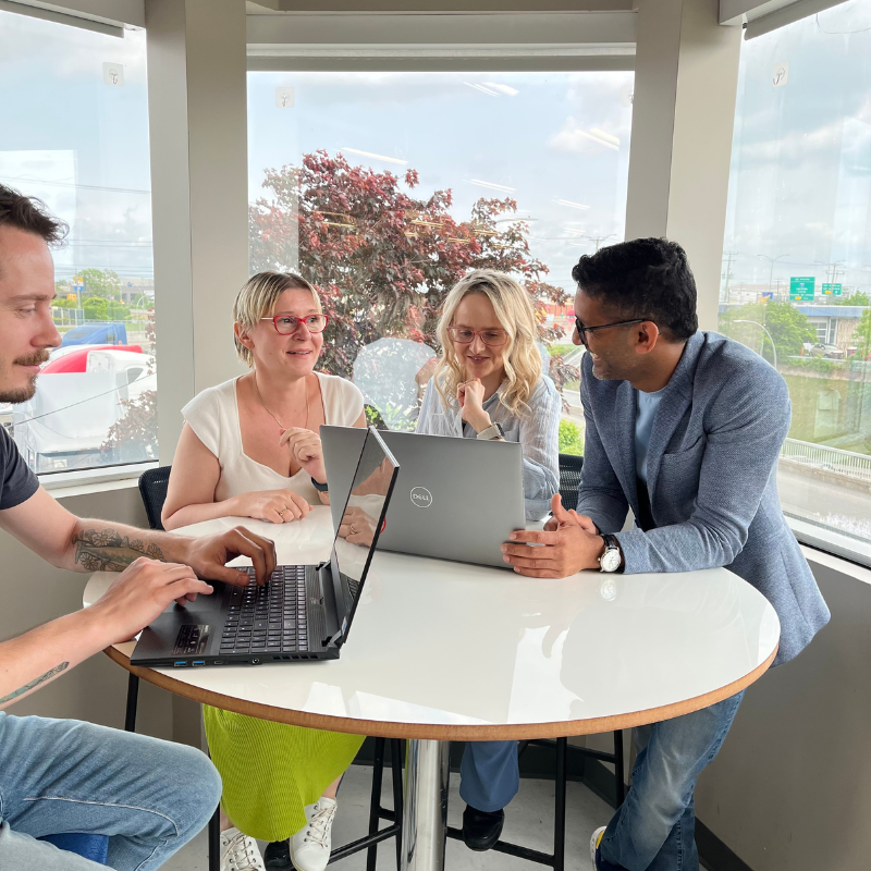Team working in the office at Imagine 4D.